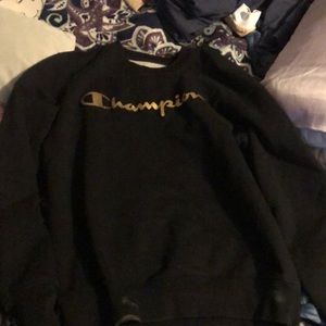 black champions sweatshirt with gold lettering